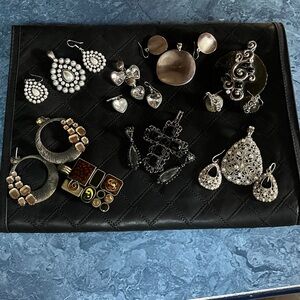 Seven sets of pendants and earring sets